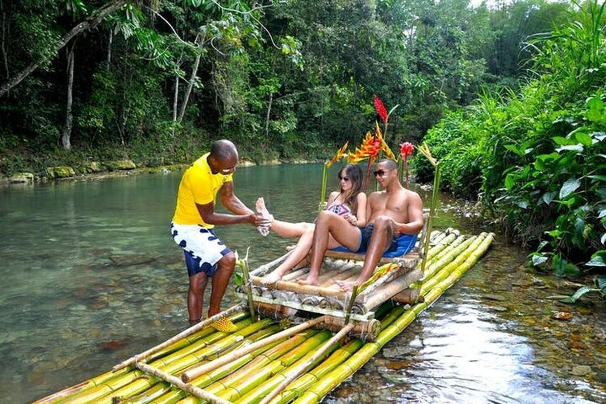 a group of people on a bamboo raft in the water
