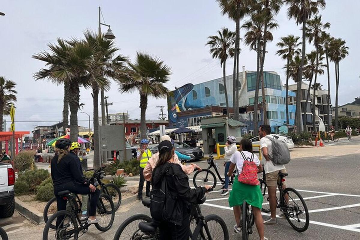 a group of people riding bikes on a street