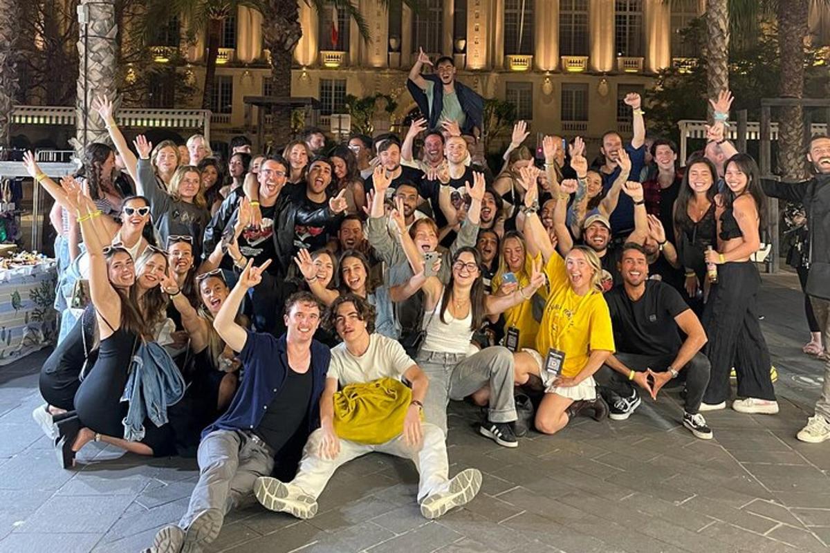 a large group of people are posing for a picture