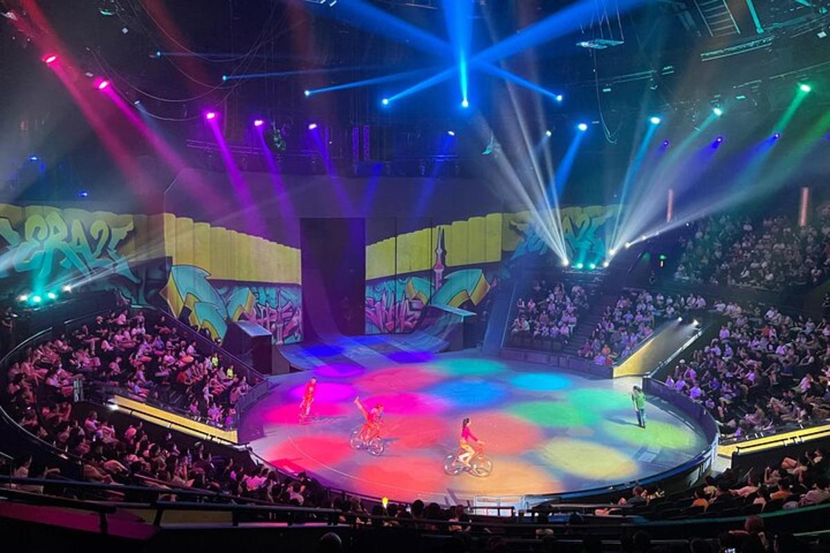 a stage with a crowd of people in an arena
