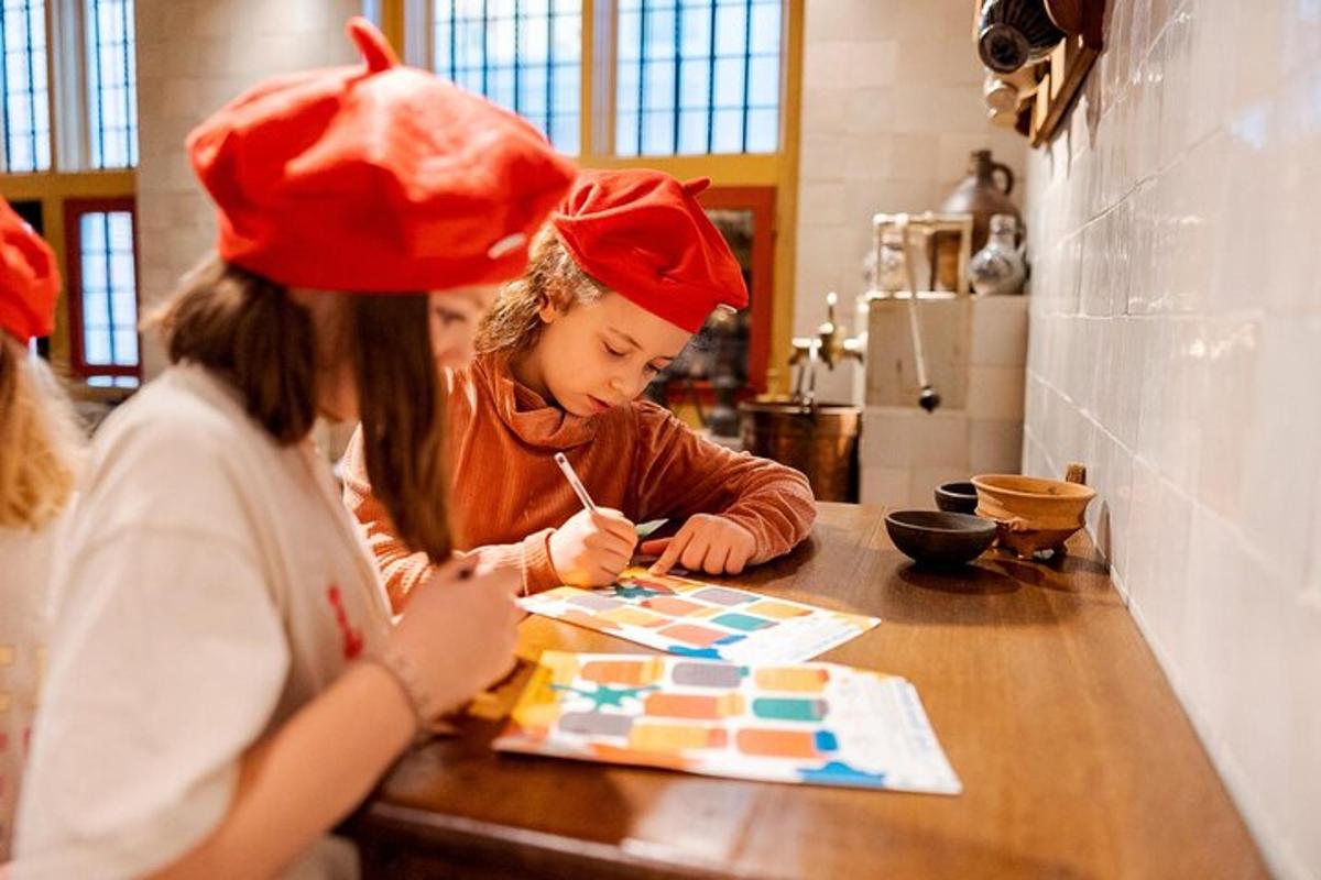 two girls wearing red hats are sitting at a counter