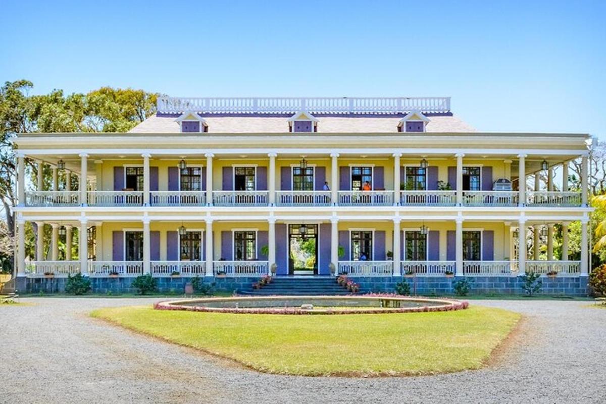 a large white house with a large yard