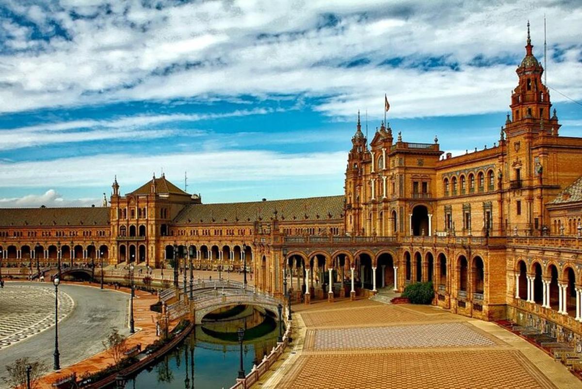 a large building with a bridge in front of it