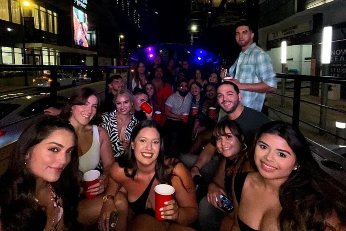 a group of people posing for a picture at a party