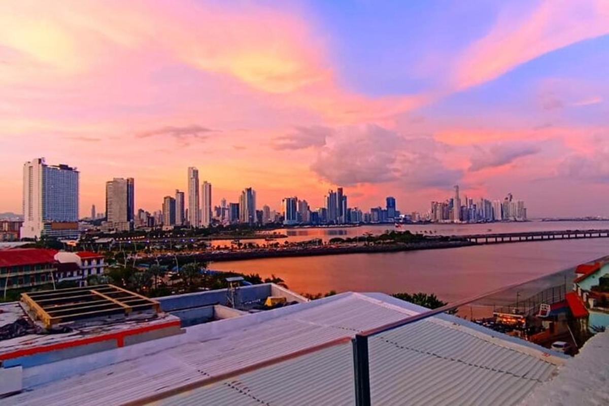 a view of a city skyline at sunset