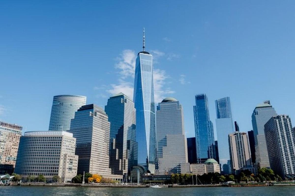 a view of a city skyline with a tall skyscraper