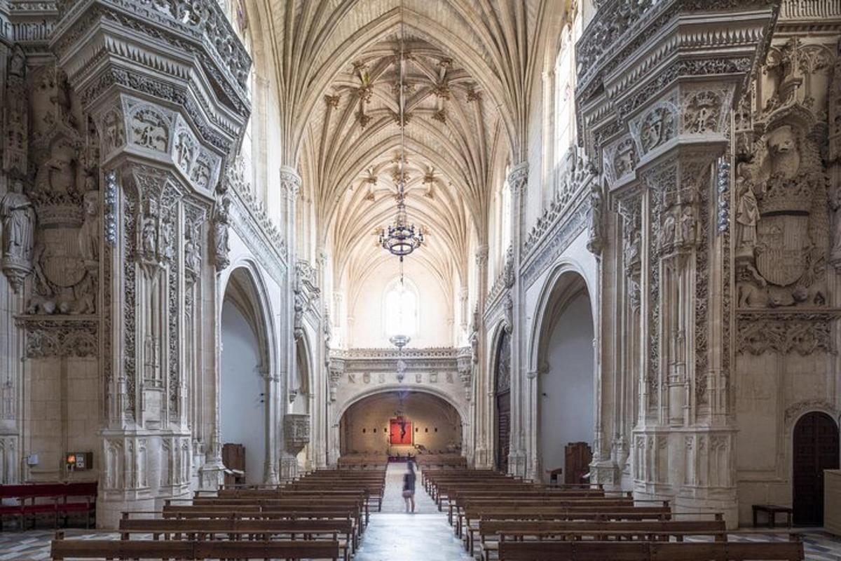 a large cathedral with a lot of pews in it
