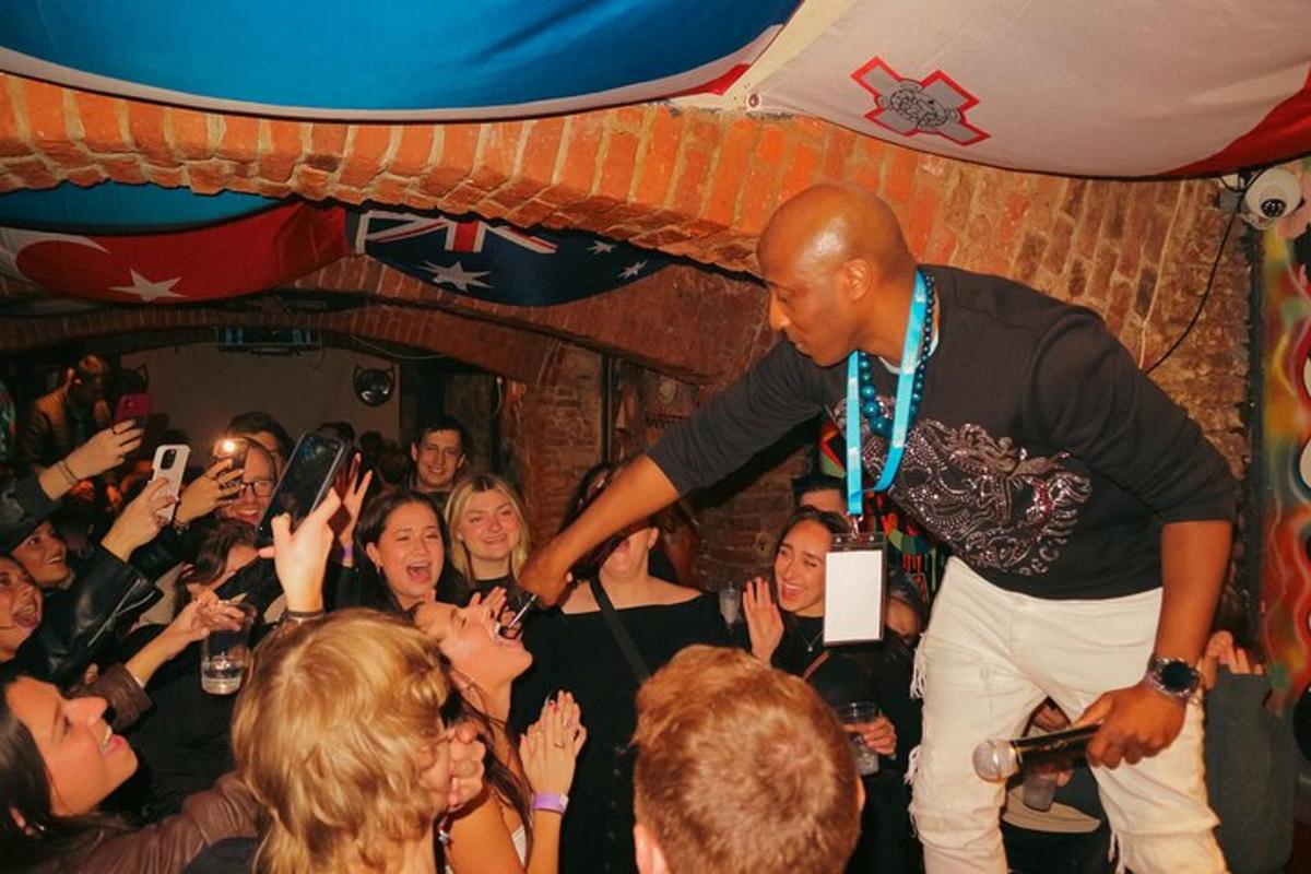 a man standing in front of a crowd of people