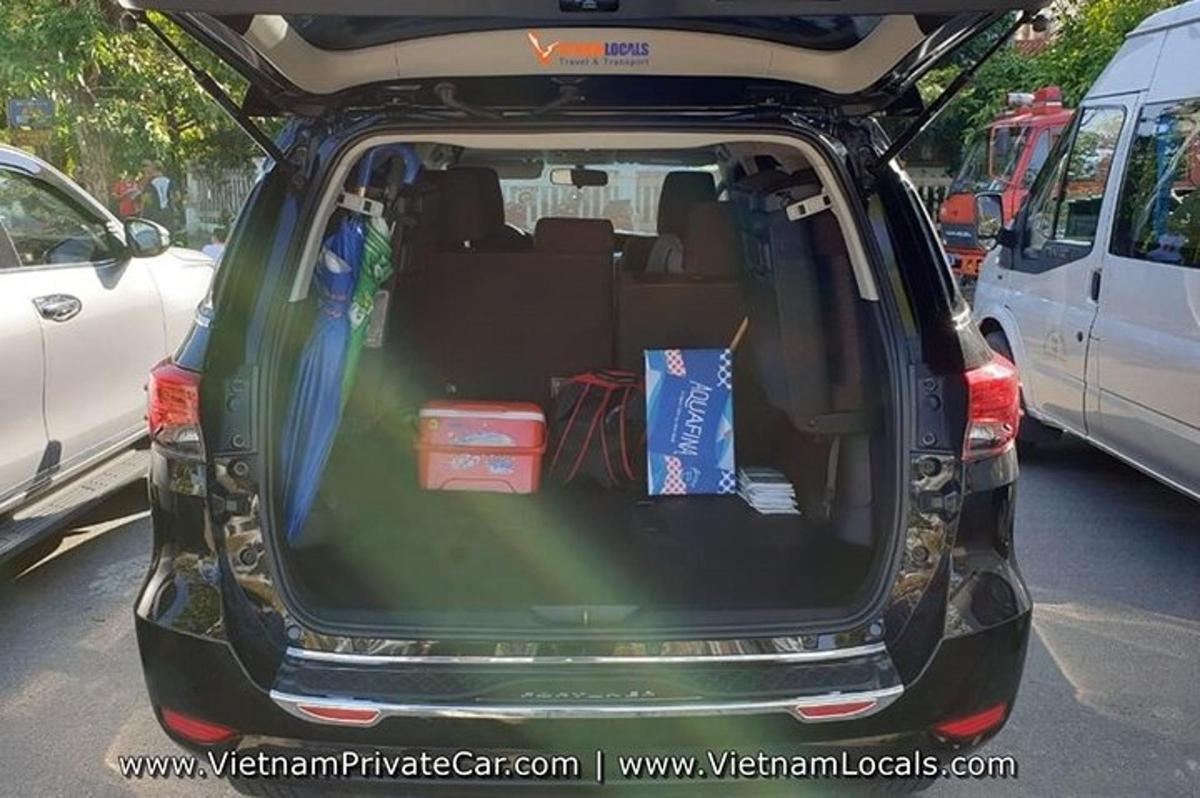 a car with its trunk open in a parking lot