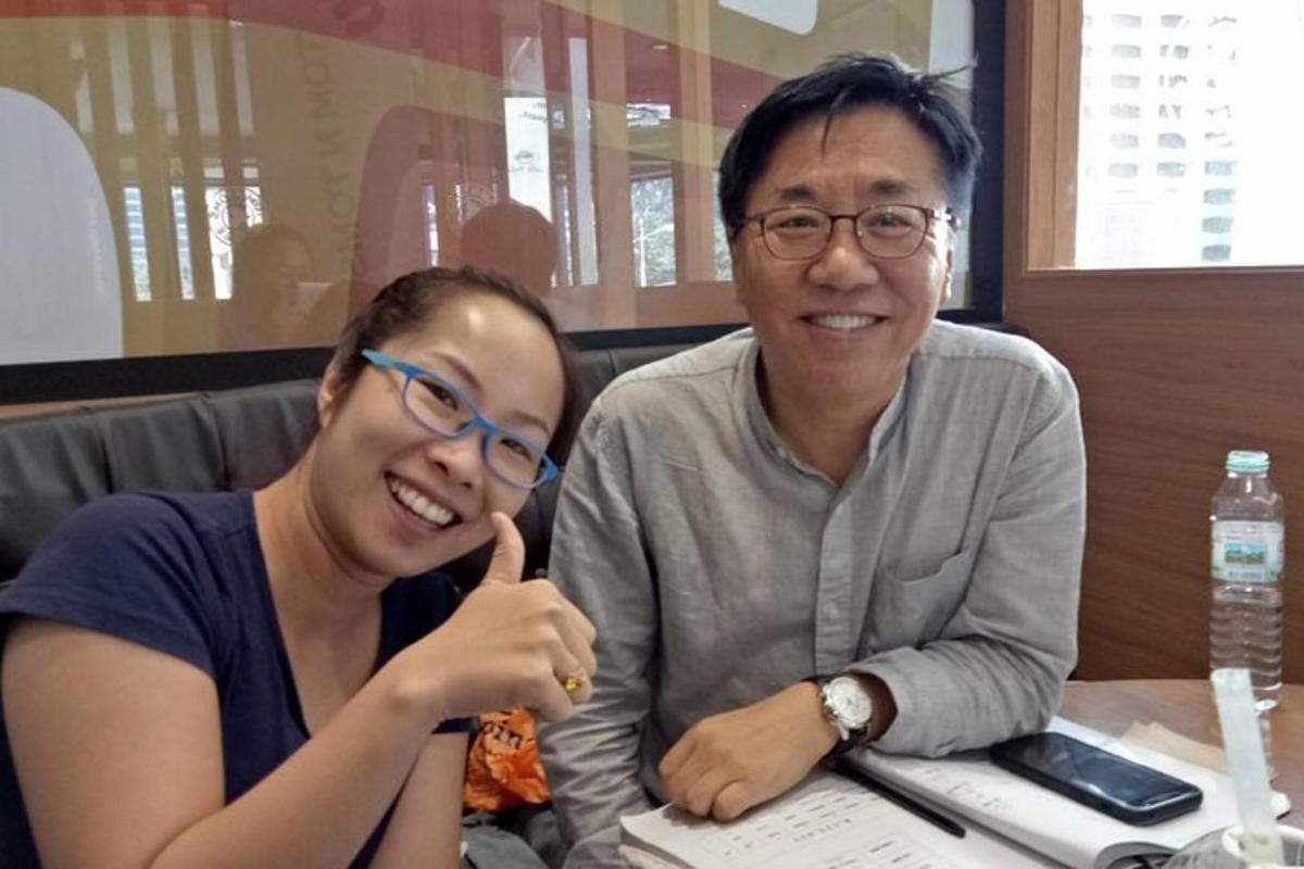 a man and a woman sitting at a table