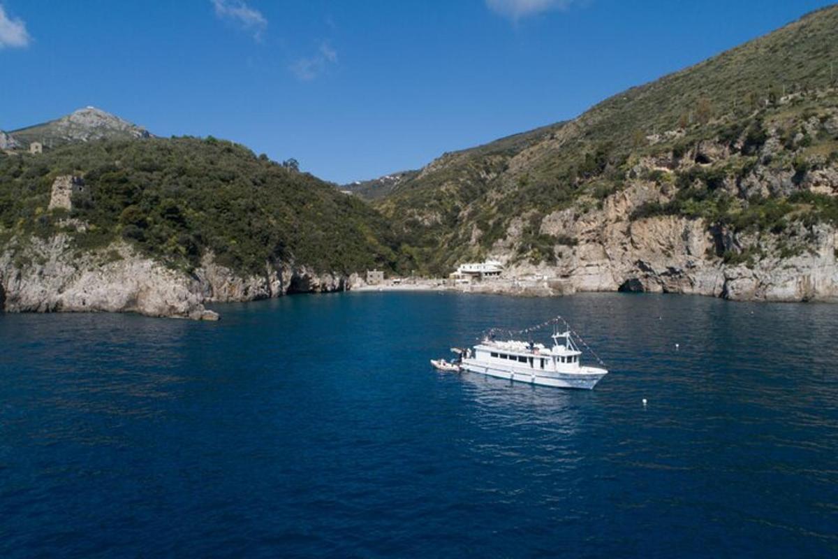 a boat in the middle of a large body of water