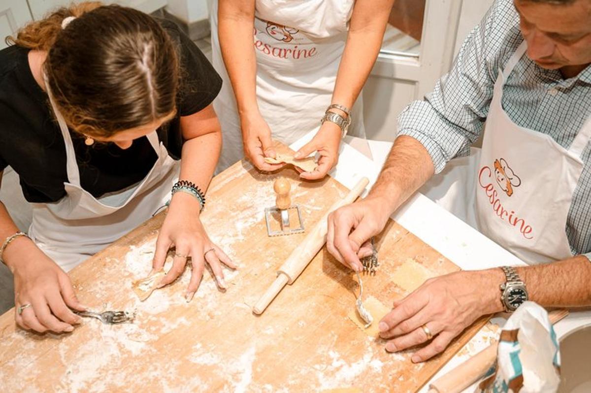 a group of people in a kitchen preparing food