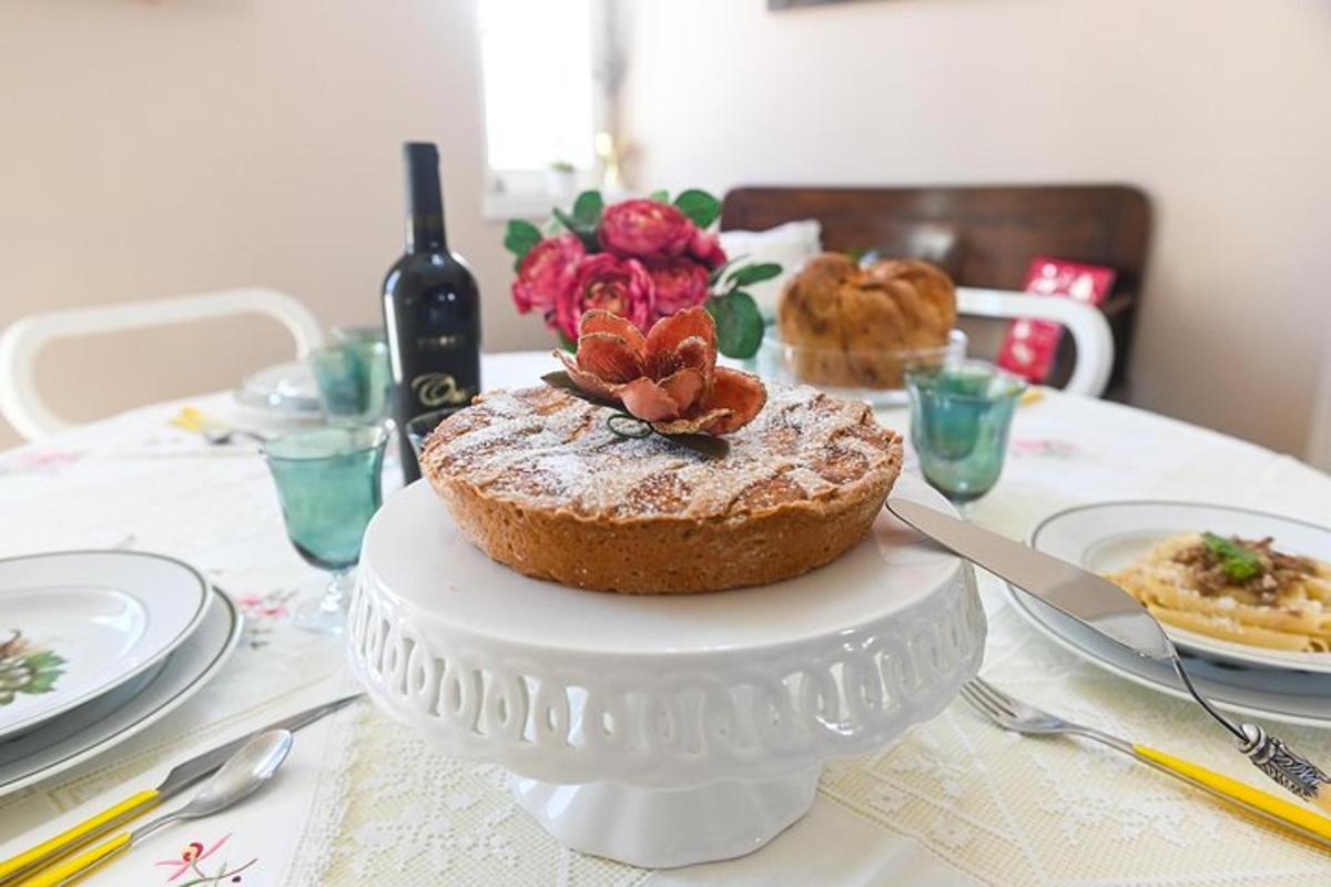 a table with a cake on top of a table