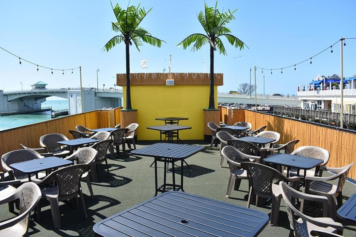 a row of tables and chairs on a patio
