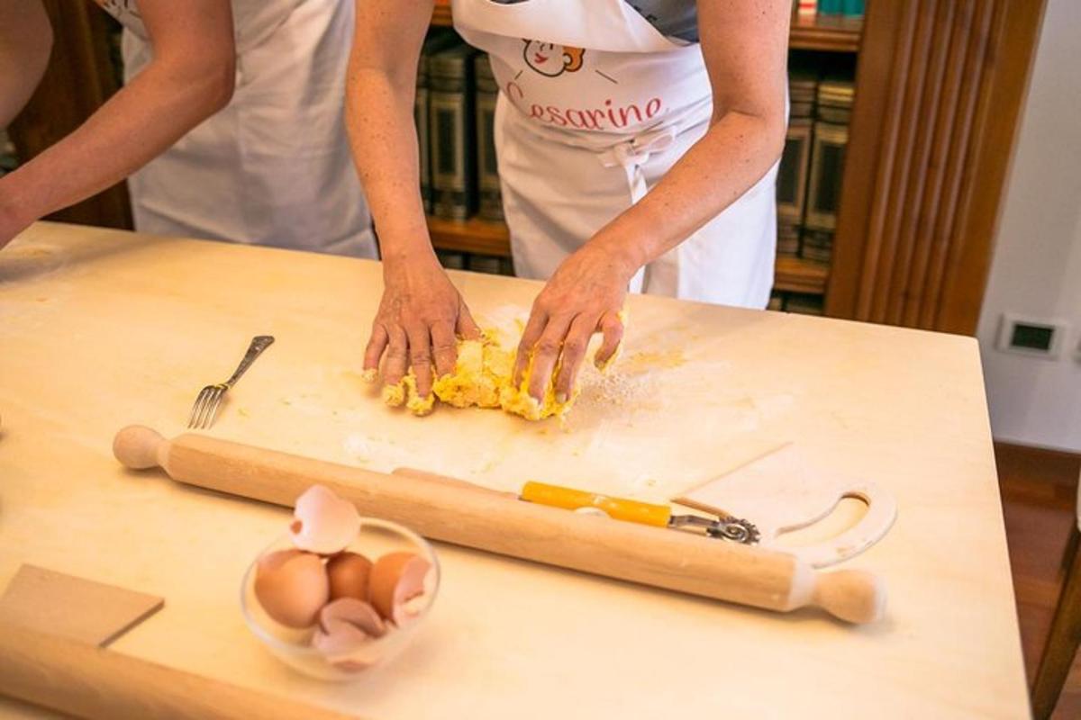 a woman is cutting eggs on a cutting board