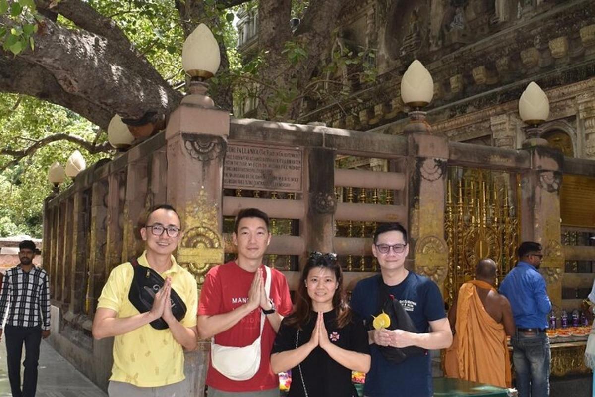 a group of people standing in front of a gate