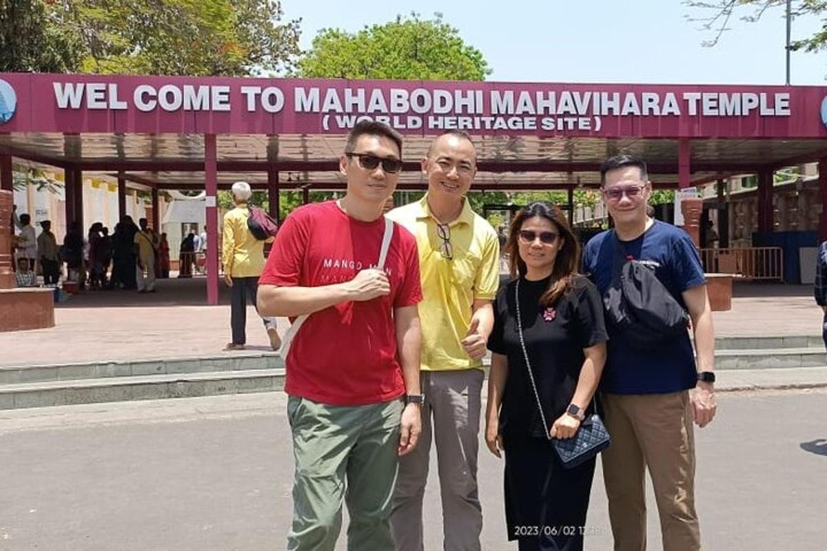 a group of people standing in front of a street