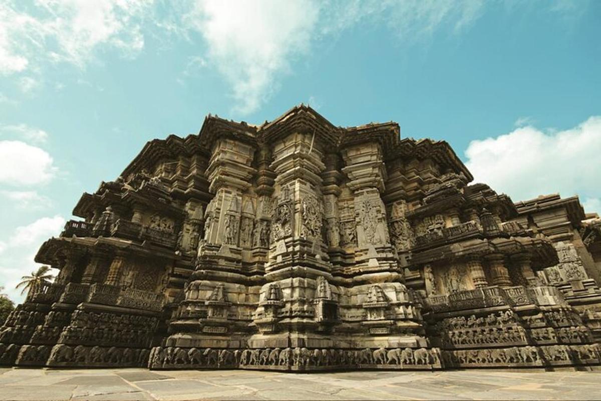 a large stone building with a sky in the background
