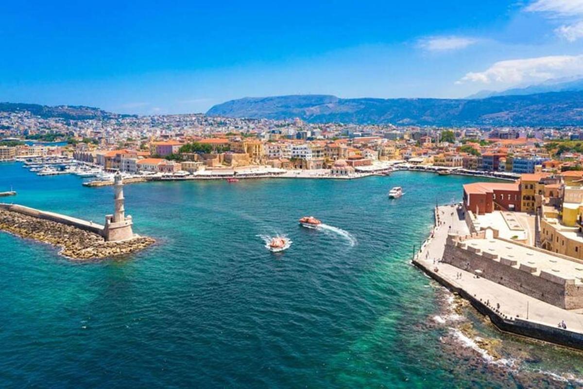 an aerial view of a city on the water