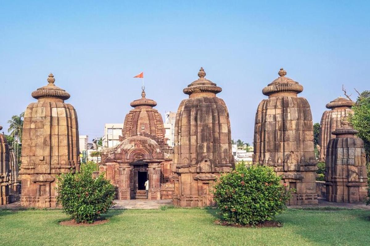a large stone building with domes on a field