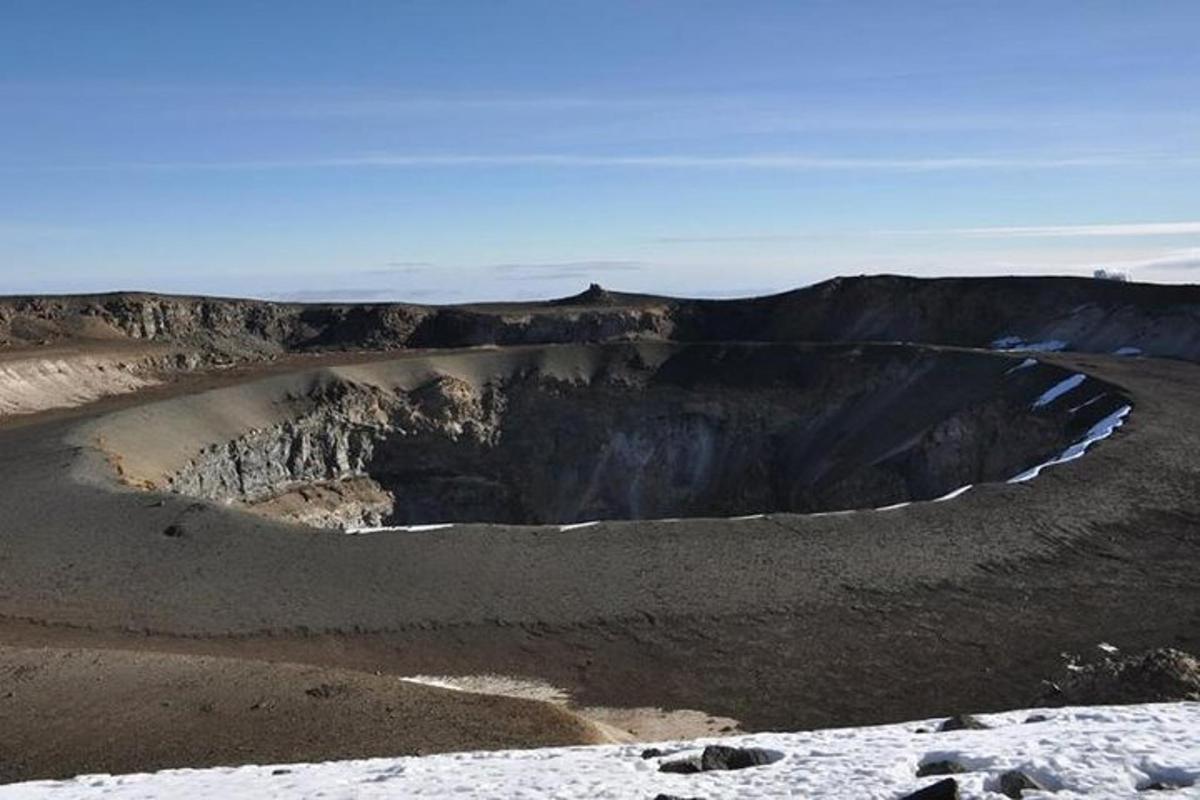 a view of a mountain with snow on it