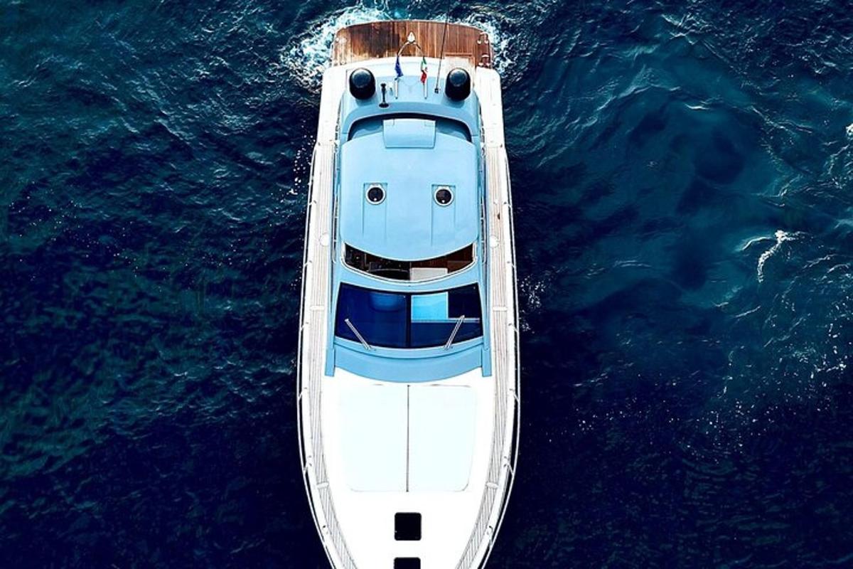 a blue and white boat in the water