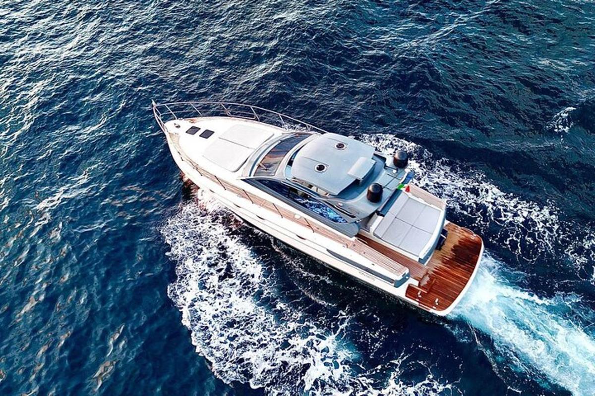 a white boat in the middle of the water