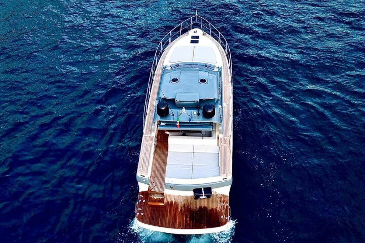 a small boat in the middle of the water