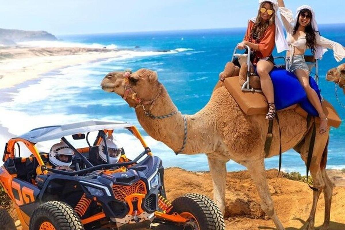 due donne a cavallo di un cammello accanto a un quad