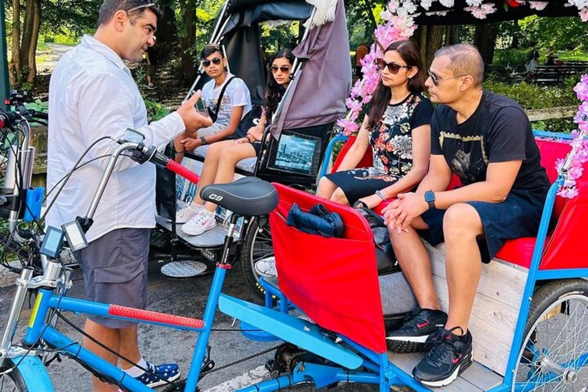 a group of people sitting on the back of a golf cart