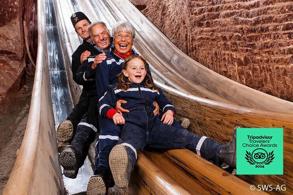 a group of people sitting on a slide