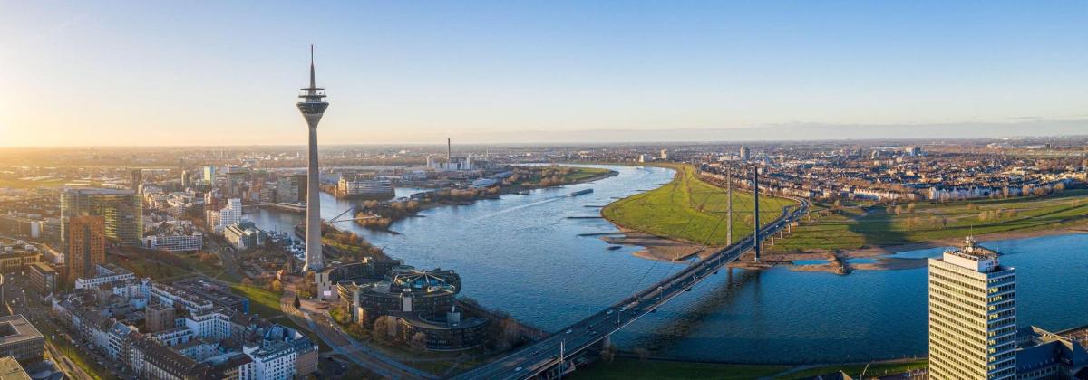 a view of a city with a bridge over a river