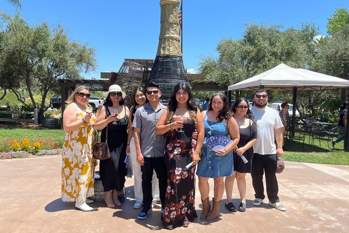 a group of people standing in front of a monument