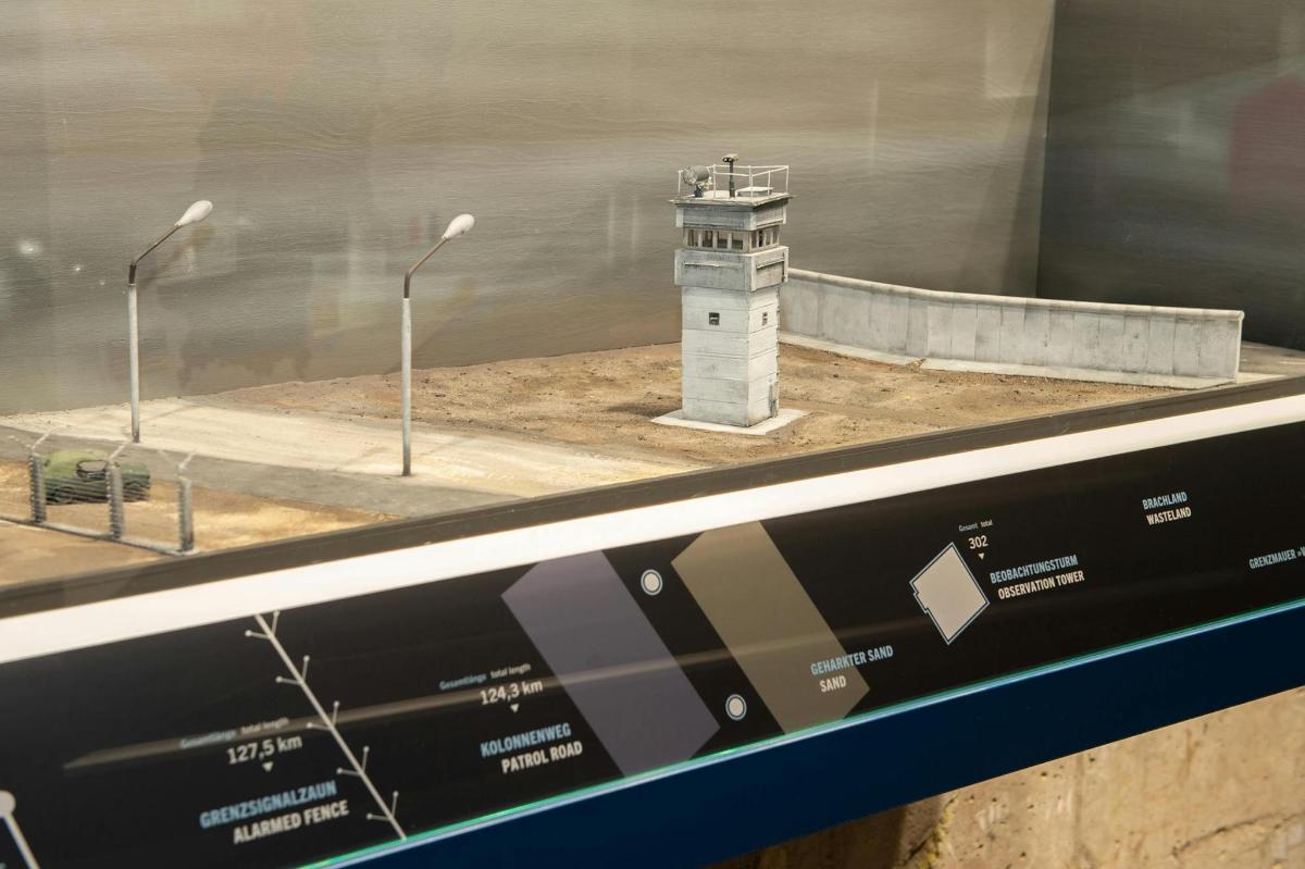 a model of a lighthouse in a display window