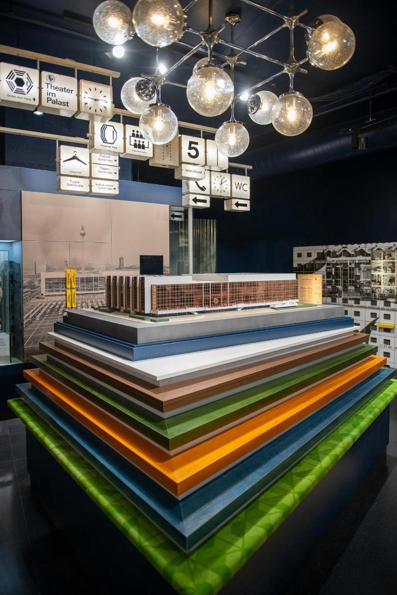 a display in a room with a bunch of colorful stairs