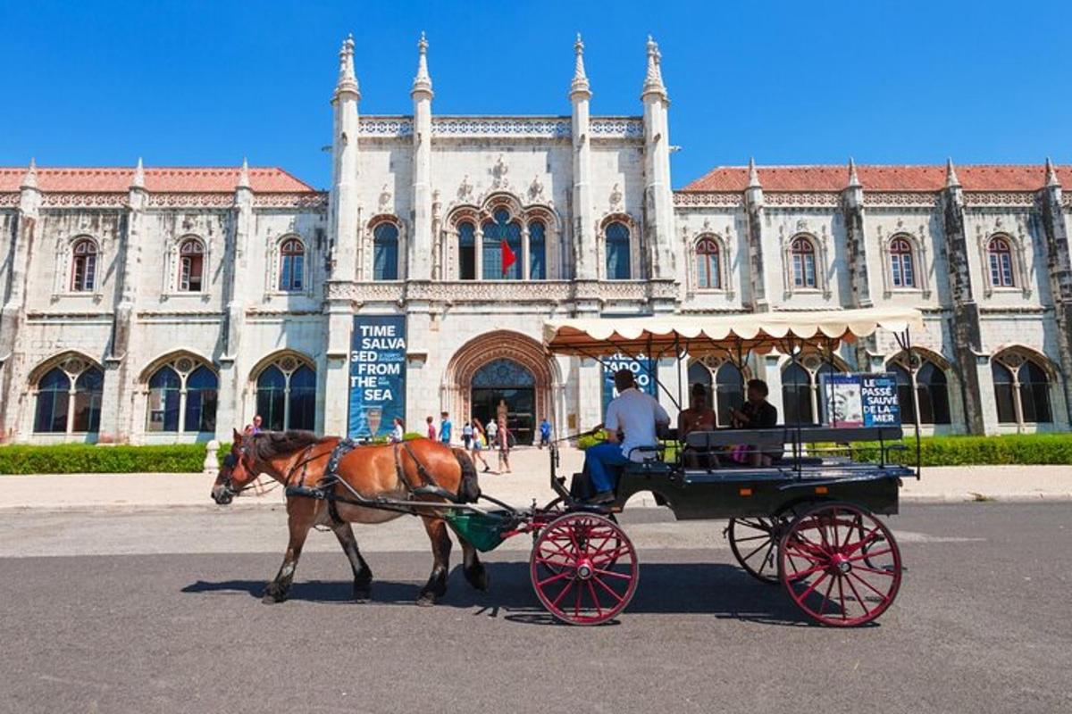a horse drawn carriage in front of a building