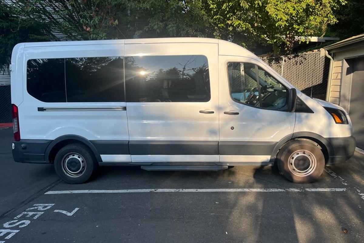 a white van parked in a parking lot