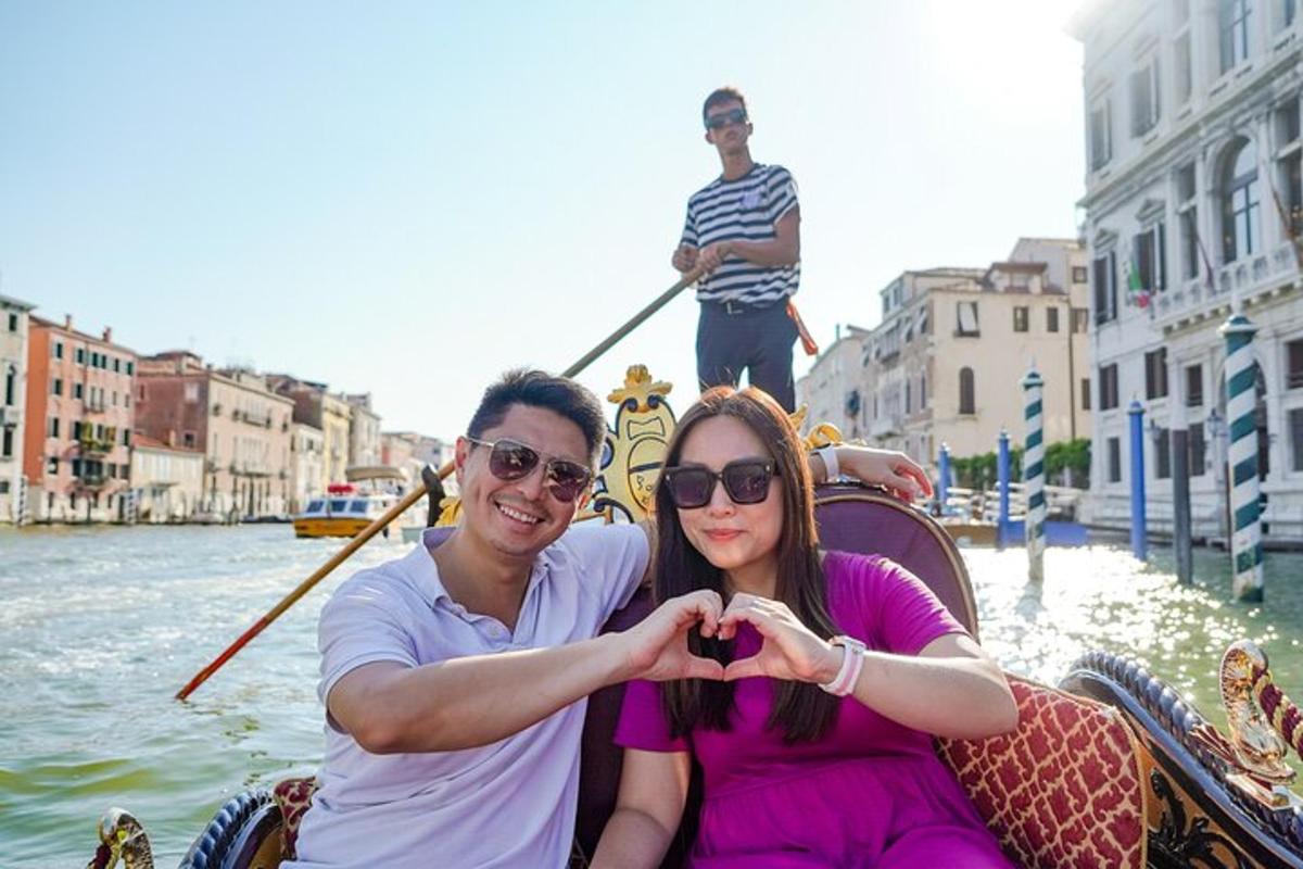 a man and a woman sitting on a gondola