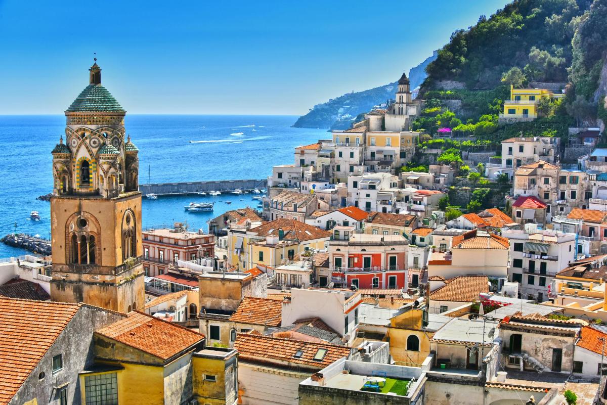 a view of a town with a clock tower
