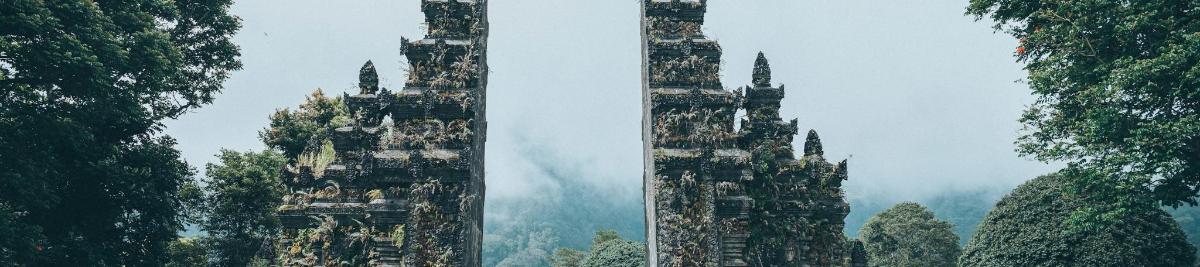 two images of an old building in the forest