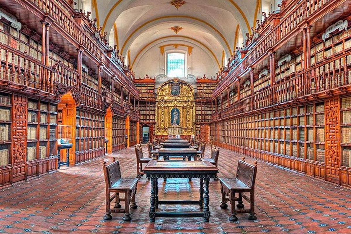 a row of tables in a library with lots of books
