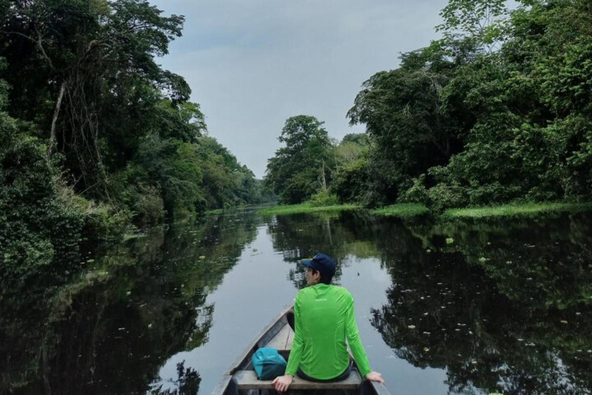 a man in a boat on a river
