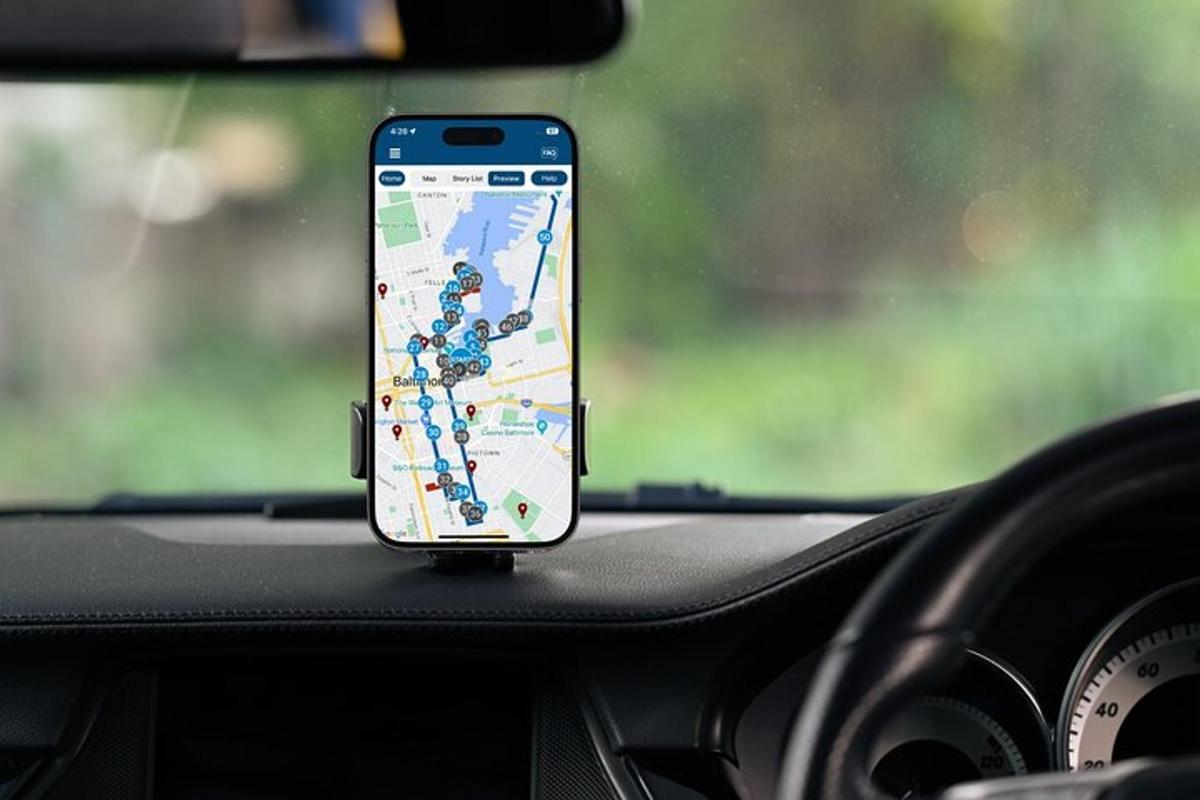a cell phone sitting on the dashboard of a car