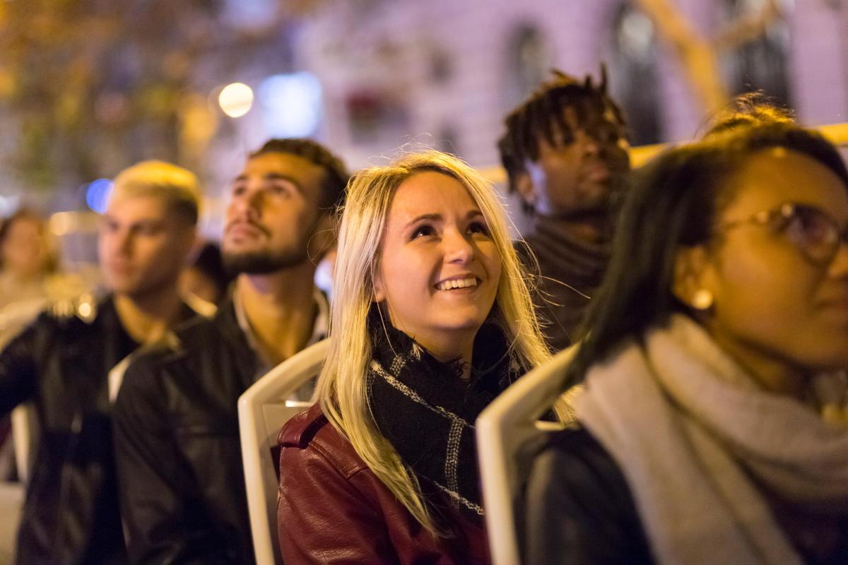 a group of people sitting in the audience
