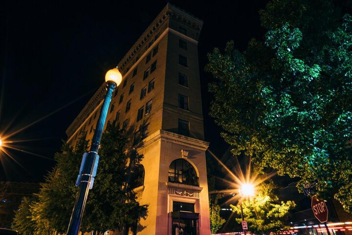 a tall building with a light pole in front of it