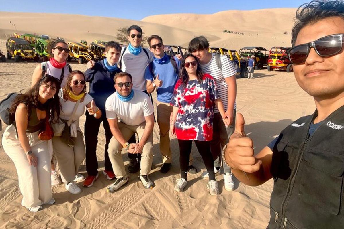 a group of people posing for a picture in the desert
