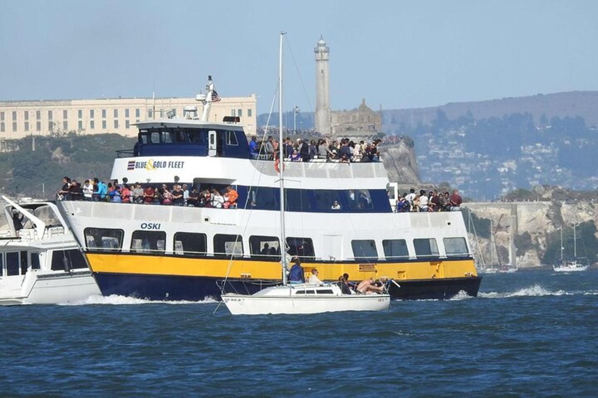 a boat with a lot of people on it in the water