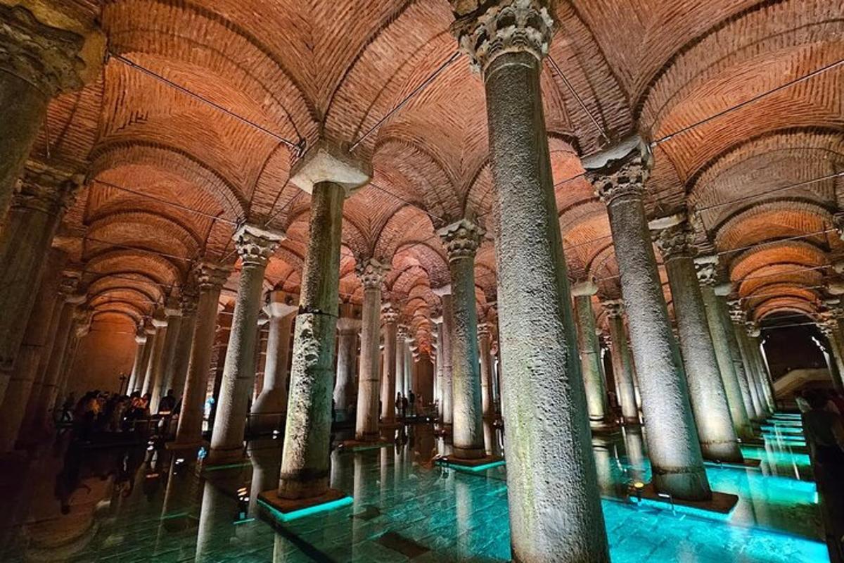a large room with columns and ceilings in a building