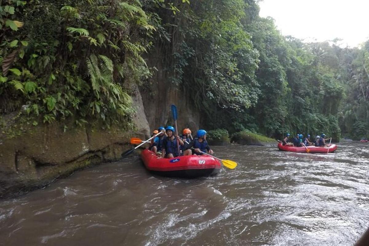 a group of people are rafting down a river