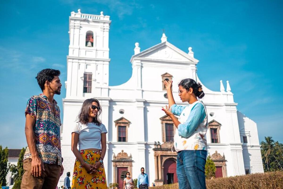 a group of people standing in front of a church